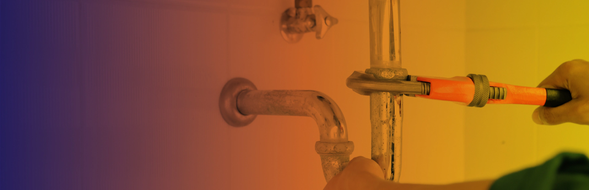 plumber working in the bathroom